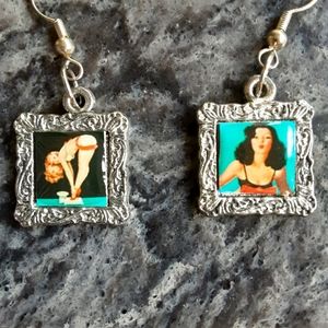 Pinup girl earrings in silver tone finish